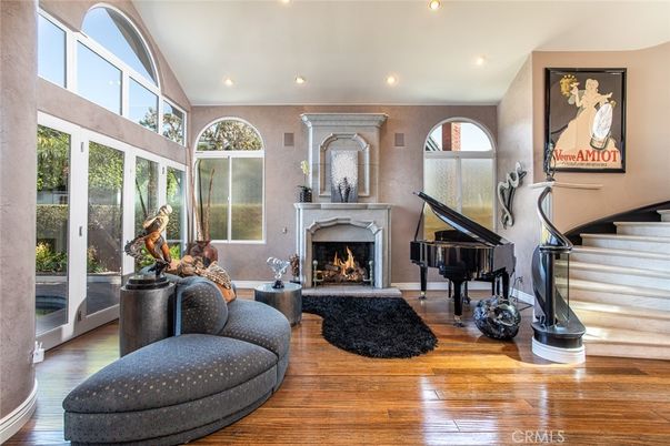 Fireplace, Interior, Piano, Recessed Lighting, Wood Texture Flooring