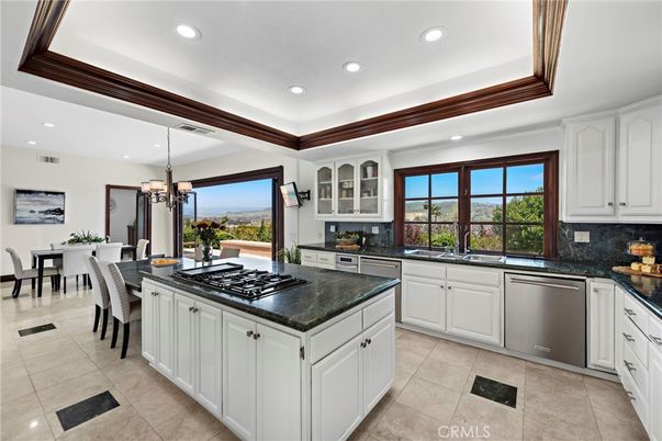 Chandelier, Dining room, Interior, Kitchen, Pendant Lights, Recessed Lighting, Stainless Steel Appliances