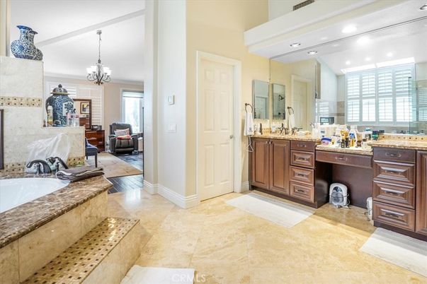 Bathroom, Chandelier, Dual Sink Vanities, Glass Shower, Interior, Recessed Lighting