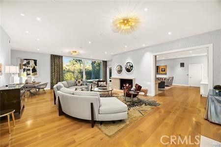 Dining room, Fireplace, Interior, Living room, Recessed Lighting, Wood Texture Flooring