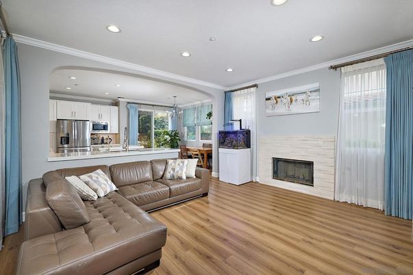 Dining room, Fireplace, Interior, Kitchen, Living room, Recessed Lighting, Stainless Steel Appliances, Wood Texture Flooring