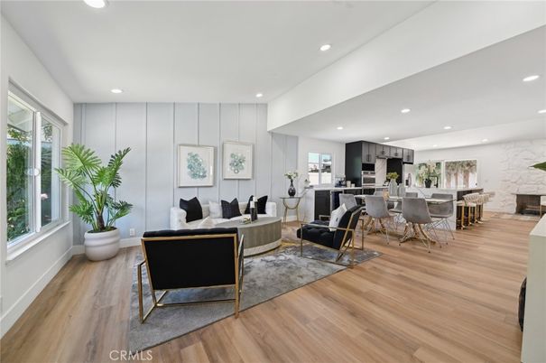 Dining room, Fireplace, Interior, Kitchen, Living room, Pendant Lights, Recessed Lighting, Stainless Steel Appliances, Wood Texture Flooring