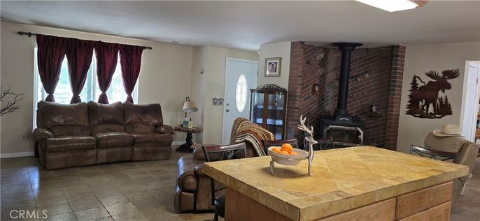Fireplace, Interior, Kitchen, Living room, Stone Walls, Tile Countertops