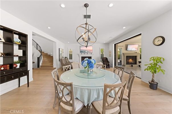Chandelier, Dining room, Fireplace, Interior, Pendant Lights, Recessed Lighting, Wood Texture Flooring