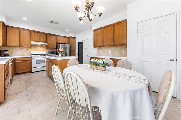 Chandelier, Dining room, Interior, Kitchen, Recessed Lighting, Stainless Steel Appliances