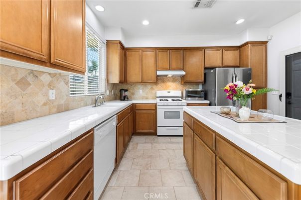 Interior, Kitchen, Recessed Lighting, Stainless Steel Appliances, Tile Countertops