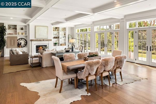 Dining room, Fireplace, Interior, Living room, Recessed Lighting, Wood Texture Flooring