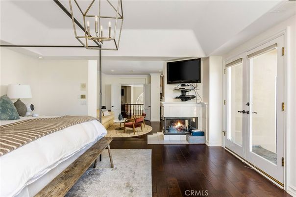 Bedroom, Fireplace, Interior, Pendant Lights, Recessed Lighting, Wood Texture Flooring
