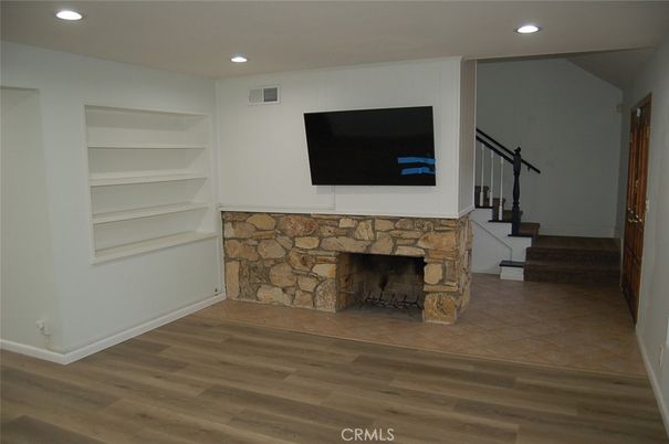 Fireplace, Interior, Recessed Lighting, Wood Texture Flooring