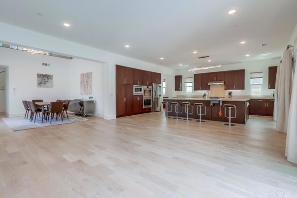 Dining room, Interior, Kitchen, Recessed Lighting, Stainless Steel Appliances, Wood Texture Flooring