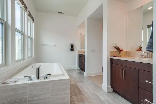 Bathroom, Dual Sink Vanities, Interior, Recessed Lighting, Wood Texture Flooring