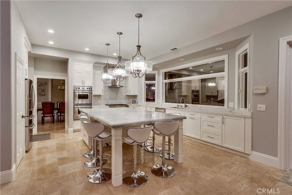 Chandelier, Dining room, Interior, Kitchen, Pendant Lights, Recessed Lighting, Stainless Steel Appliances