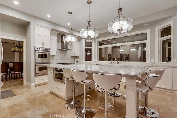 Chandelier, Dining room, Interior, Kitchen, Pendant Lights, Recessed Lighting, Stainless Steel Appliances