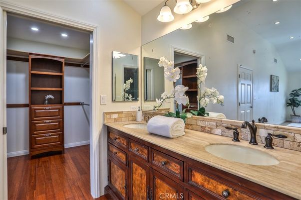 Bathroom, Dual Sink Vanities, Interior, Recessed Lighting, Wood Texture Flooring