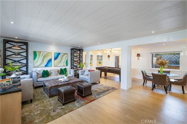 Billiard Table, Chandelier, Dining room, Game Room, Interior, Living room, Recessed Lighting, Wood Texture Flooring