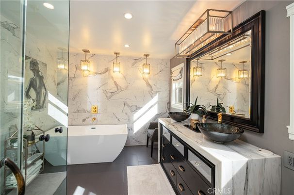 Bathroom, Dual Sink Vanities, Free Standing Baths, Glass Shower, Interior, Marble Walls, Recessed Lighting