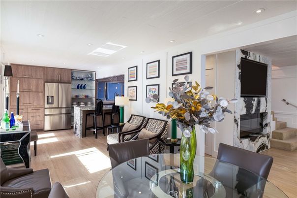 Dining room, Interior, Kitchen, Living room, Recessed Lighting, Stainless Steel Appliances, Wood Texture Flooring