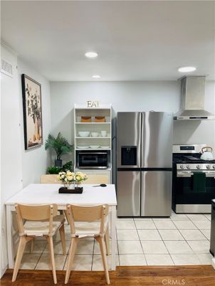 Dining room, Interior, Kitchen, Recessed Lighting, Stainless Steel Appliances, Wood Texture Flooring