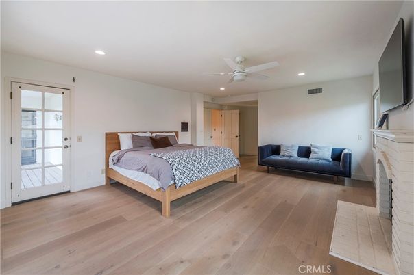 Bedroom, Fireplace, Interior, Recessed Lighting, Wood Texture Flooring