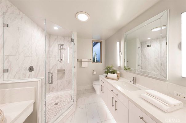 Bathroom, Dual Sink Vanities, Glass Shower, Interior, Marble, Marble Walls, Recessed Lighting