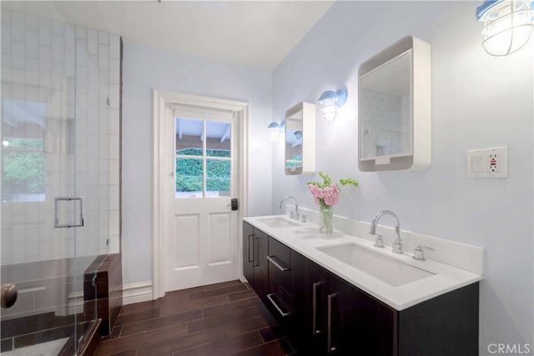 Bathroom, Dual Sink Vanities, Glass Shower, Interior, Wood Texture Flooring