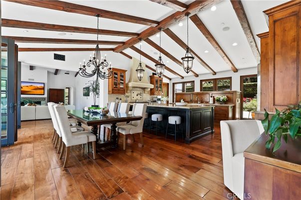 Chandelier, Dining room, Interior, Kitchen, Pendant Lights, Recessed Lighting, Wooden Beams, Wood Texture Flooring