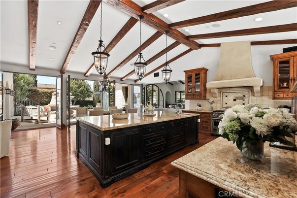 Chandelier, Fireplace, Interior, Kitchen, Pendant Lights, Recessed Lighting, Wooden Beams, Wood Texture Flooring