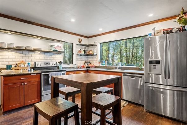 Dining room, Interior, Kitchen, Recessed Lighting, Stainless Steel Appliances, Wood Texture Flooring