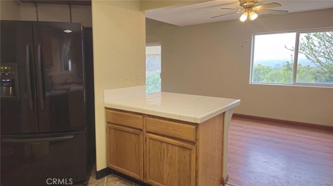 Interior, Kitchen, Tile Countertops, Wood Texture Flooring