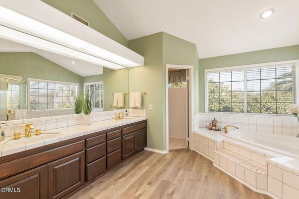 Bathroom, Dual Sink Vanities, Interior, Recessed Lighting, Tile Countertops, Wood Texture Flooring