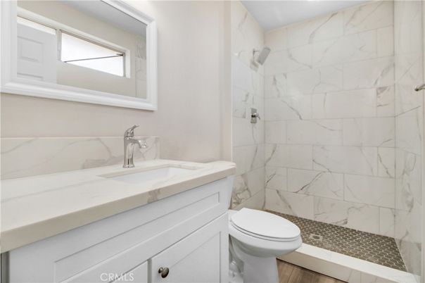 Bathroom, Glass Shower, Interior, Marble Walls, Wood Texture Flooring