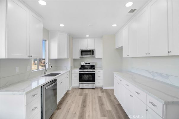 Interior, Kitchen, Recessed Lighting, Stainless Steel Appliances, Wood Texture Flooring