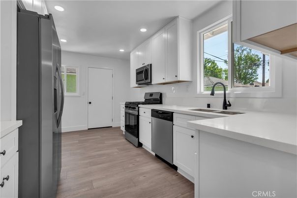 Interior, Kitchen, Recessed Lighting, Stainless Steel Appliances, Wood Texture Flooring