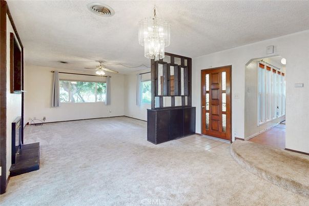 Chandelier, Empty room, Fireplace, Interior