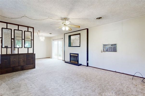 Chandelier, Empty room, Fireplace, Interior