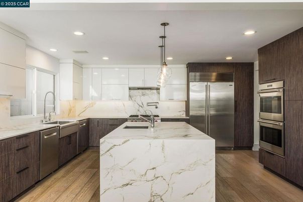 Interior, Kitchen, Pendant Lights, Recessed Lighting, Stainless Steel Appliances, Wood Texture Flooring