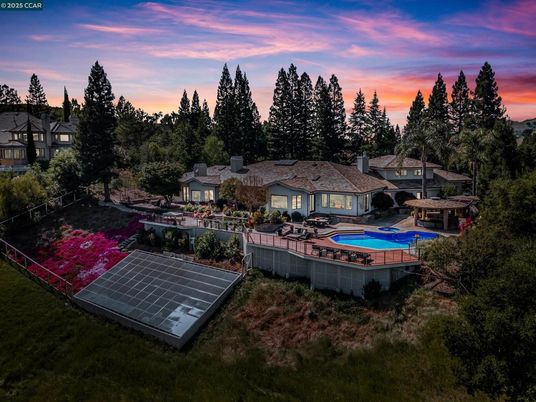 Exterior, Pool, Solar Panels