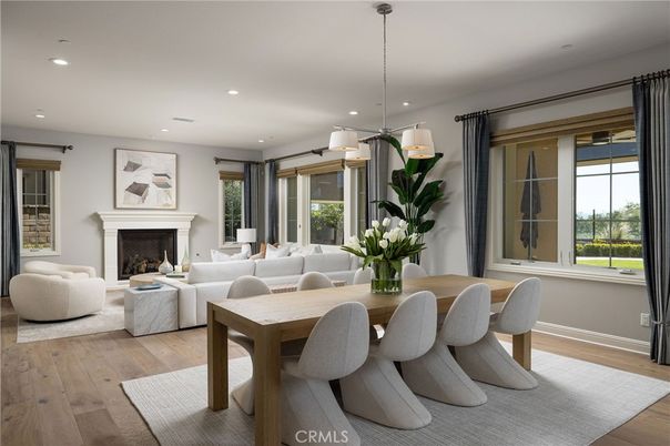 Dining room, Fireplace, Interior, Living room, Pendant Lights, Recessed Lighting, Wood Texture Flooring