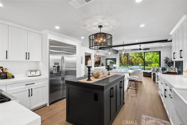 Chandelier, Interior, Kitchen, Pendant Lights, Recessed Lighting, Stainless Steel Appliances, Wood Texture Flooring