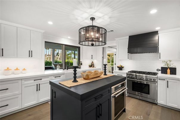 Chandelier, Interior, Kitchen, Recessed Lighting, Stainless Steel Appliances, Wood Texture Flooring