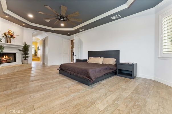 Bedroom, Fireplace, Interior, Recessed Lighting, Wood Texture Flooring