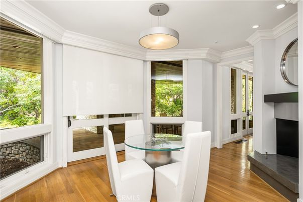 Dining room, Fireplace, Interior, Pendant Lights, Recessed Lighting, Wood Texture Flooring