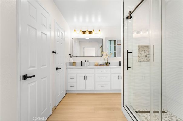 Bathroom, Dual Sink Vanities, Glass Shower, Interior, Wood Texture Flooring