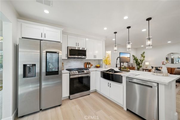 Interior, Kitchen, Pendant Lights, Recessed Lighting, Stainless Steel Appliances, Wood Texture Flooring