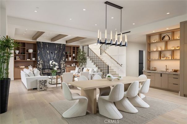 Dining room, Fireplace, Interior, Living room, Pendant Lights, Recessed Lighting, Wood Texture Flooring