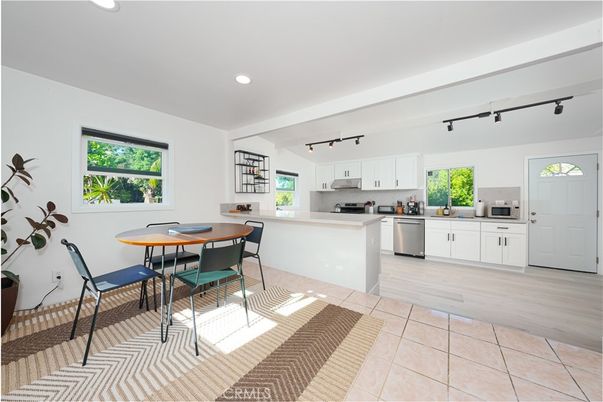 Dining room, Interior, Kitchen, Recessed Lighting, Stainless Steel Appliances, Wood Texture Flooring