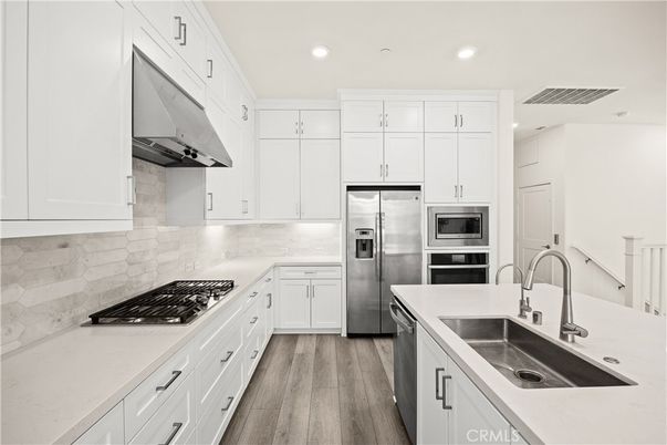 Interior, Kitchen, Recessed Lighting, Stainless Steel Appliances, Wood Texture Flooring