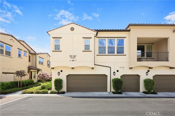 Attached, Exterior, Facade, Spanish Mediterranean