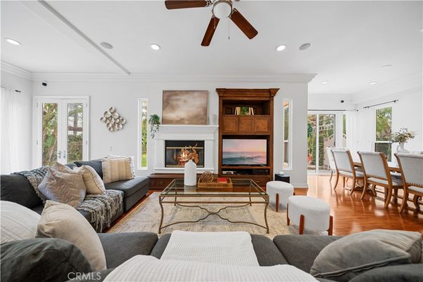 Dining room, Fireplace, Interior, Living room, Recessed Lighting, Wood Texture Flooring