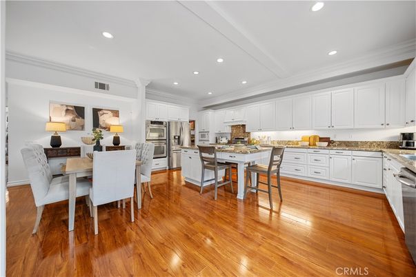 Dining room, Interior, Kitchen, Recessed Lighting, Stainless Steel Appliances, Wood Texture Flooring